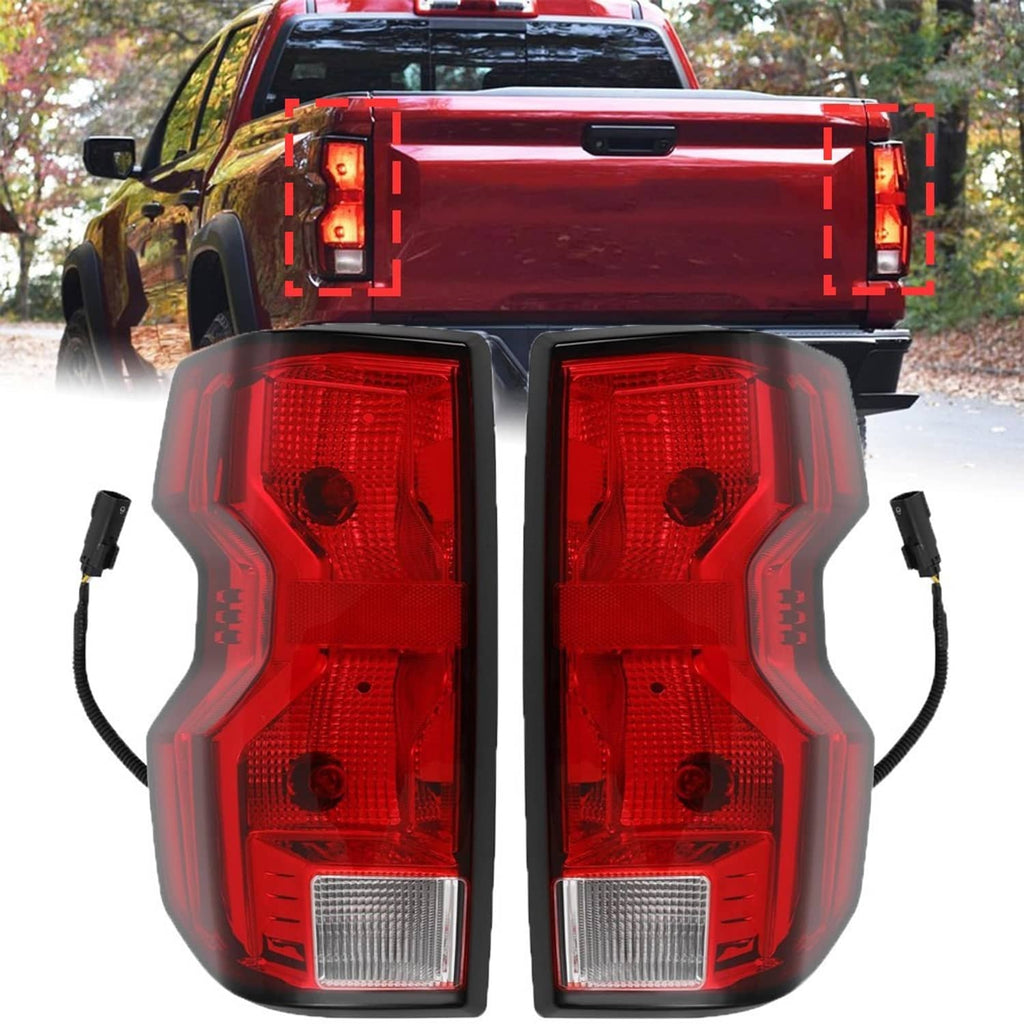 Truck tail light pair, red halogen housings with clear reverse lenses and bulbs