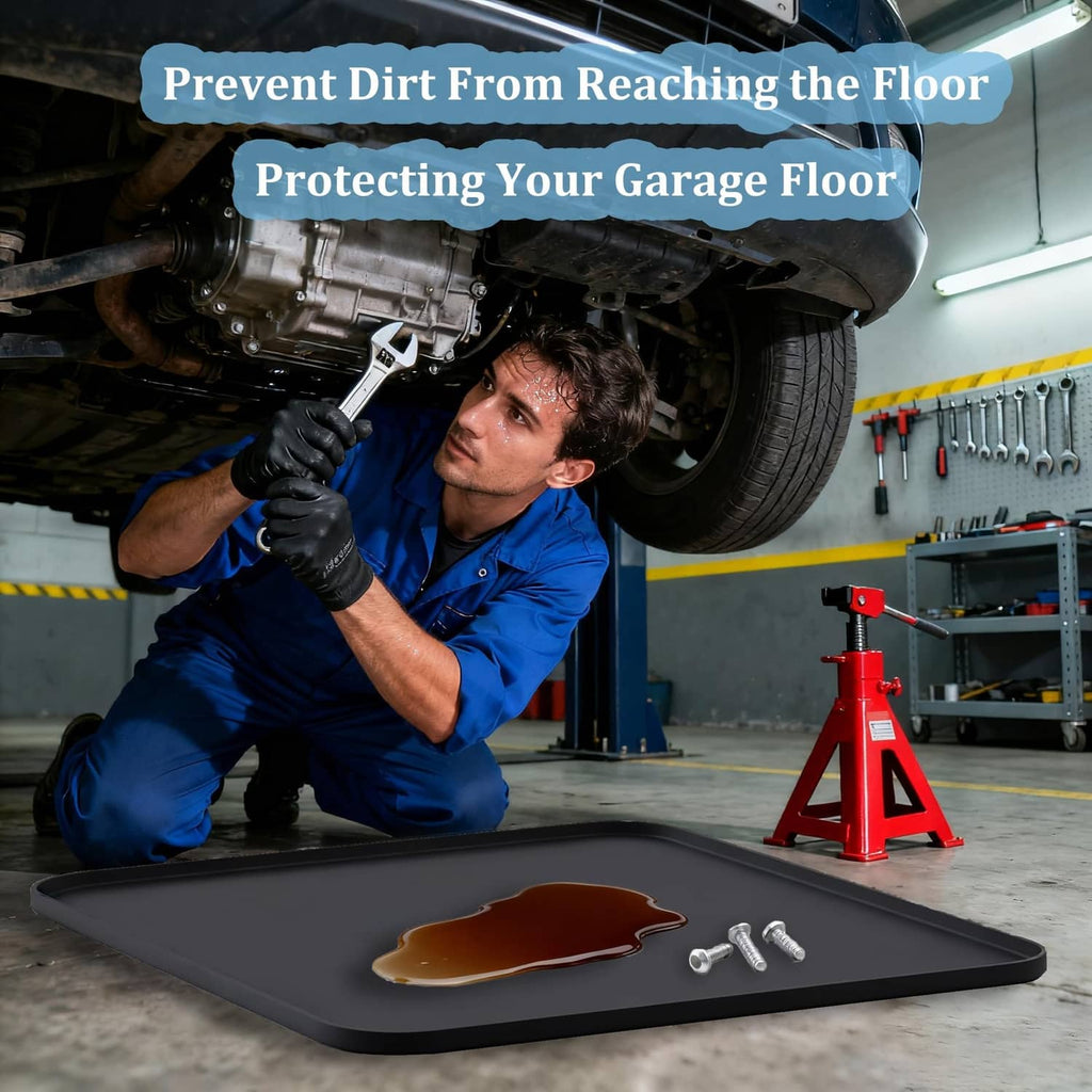 Garage oil drip pan mat with oil spill, used under an elevated car