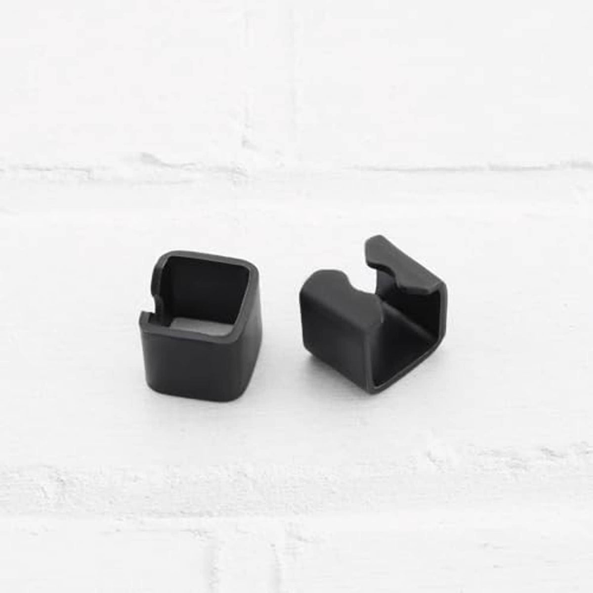 Black rubber trolley jack link clip, slotted U-shape with pin notch