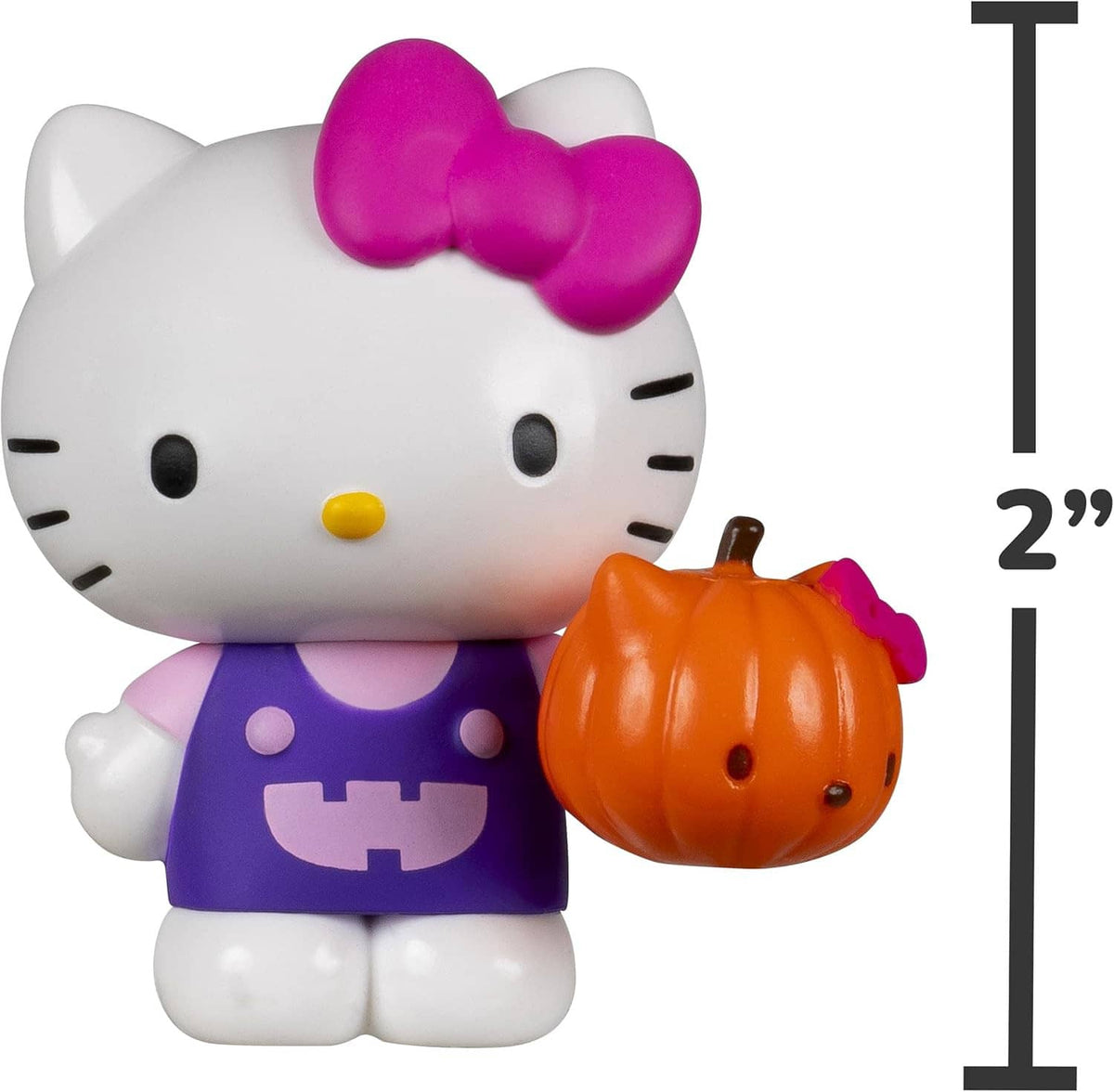 Hello Kitty figure in purple outfit holding a Halloween pumpkin