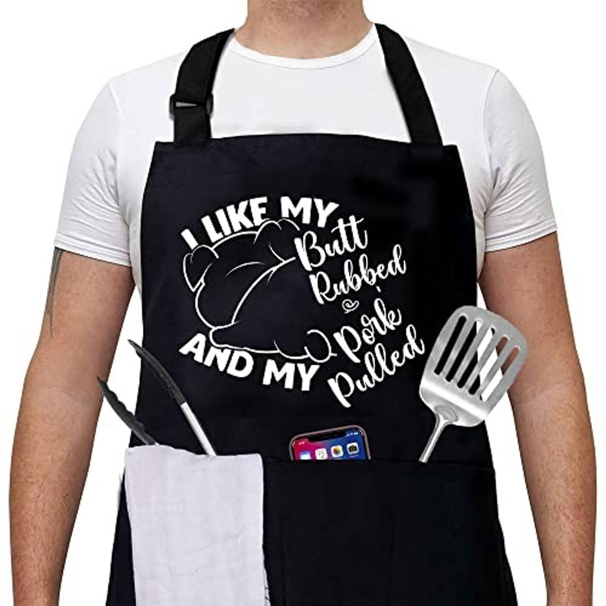 Black chef-style grill apron with humorous graphic text and utensil icons, neck strap