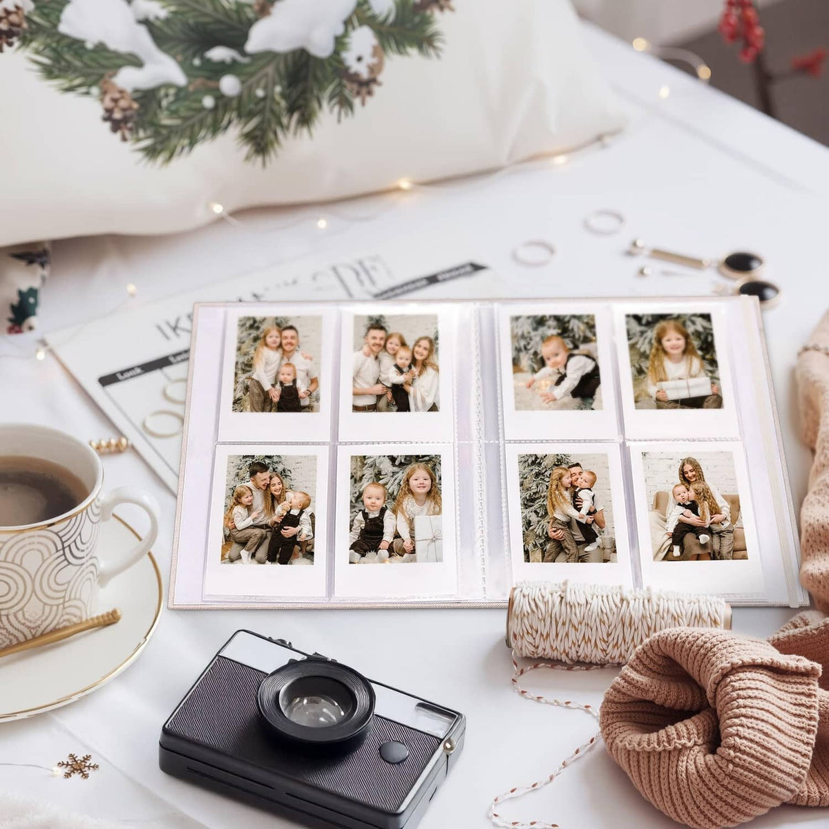 Beige Polaroid photo album with clear page inserts holding multiple 2x3 photos