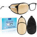 Left eyepatch set for glasses: beige pad with black trim, shown on eyeglasses frame.