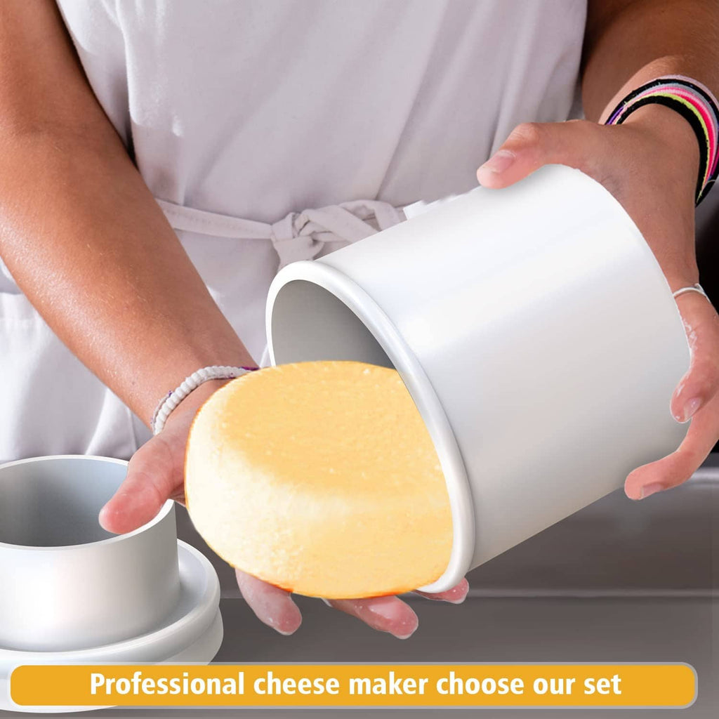 Hands using white follower press to mold yellow cheese in a round base