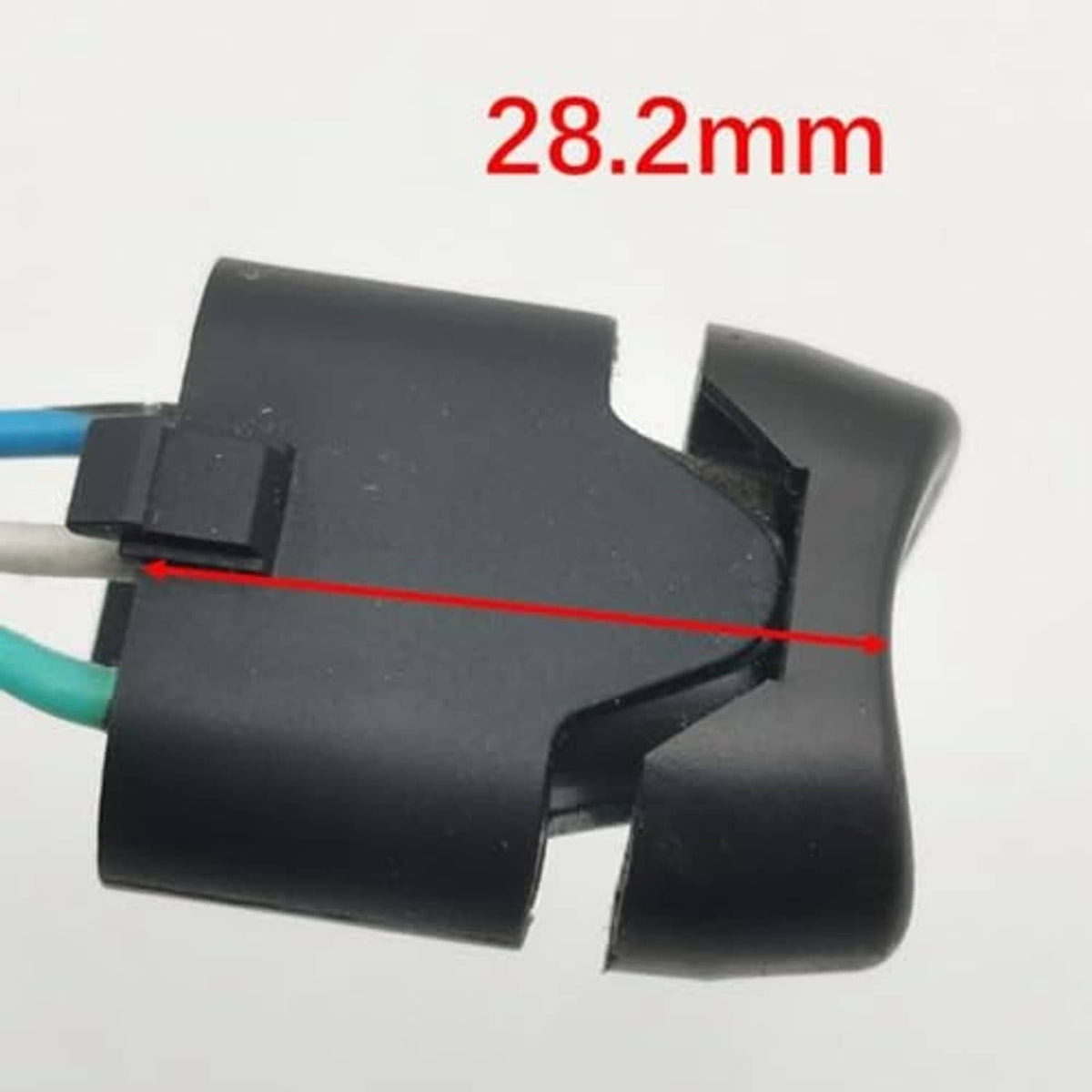 Black trim switch housing with 28.2mm dimension marked