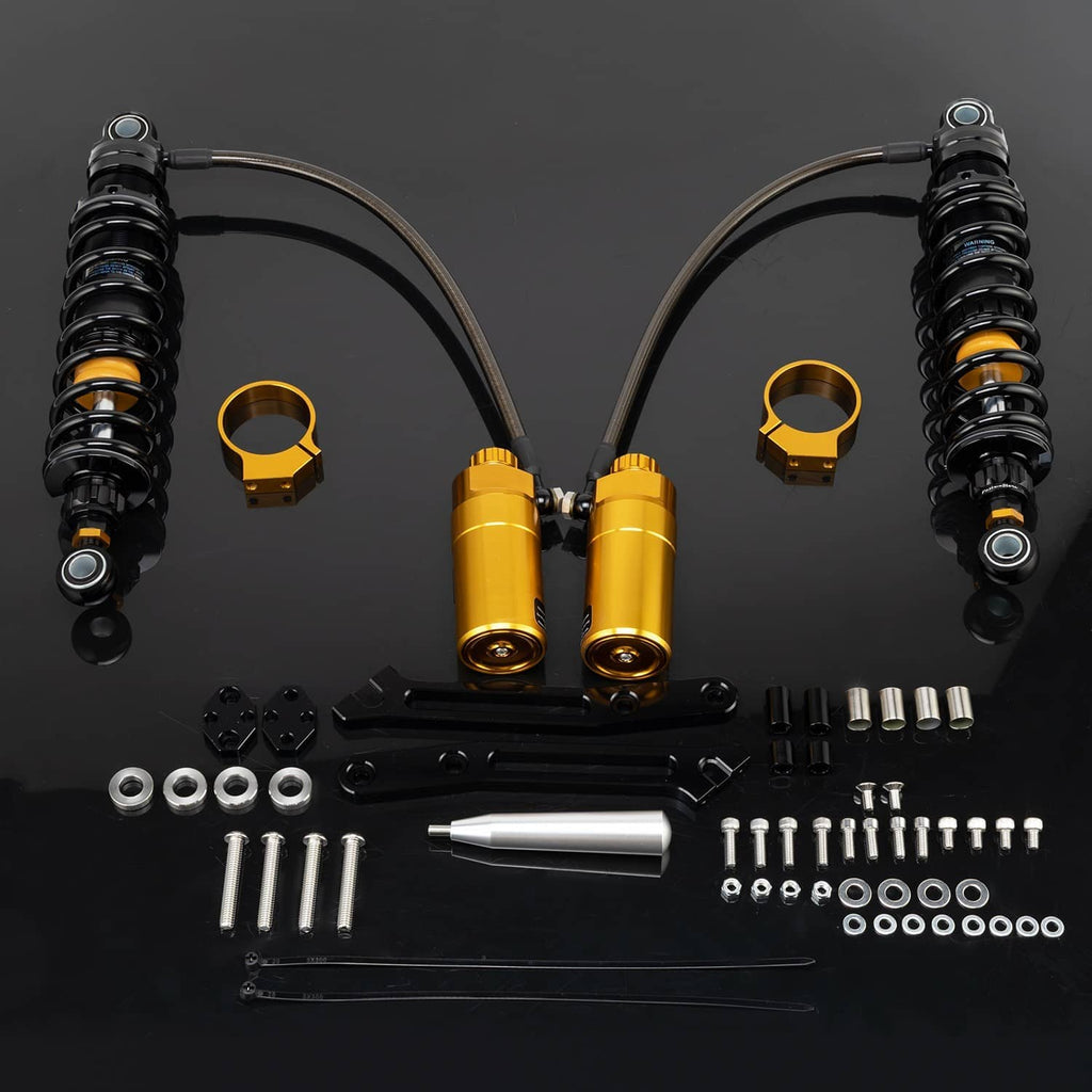 Gold and black rear suspension shock set with mounting hardware and bushings