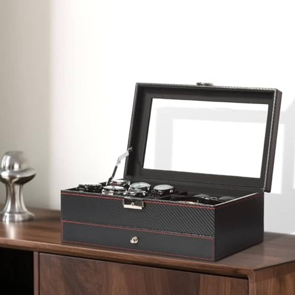 Closed black watch jewelry box with hinged clear lid and red stitched trim