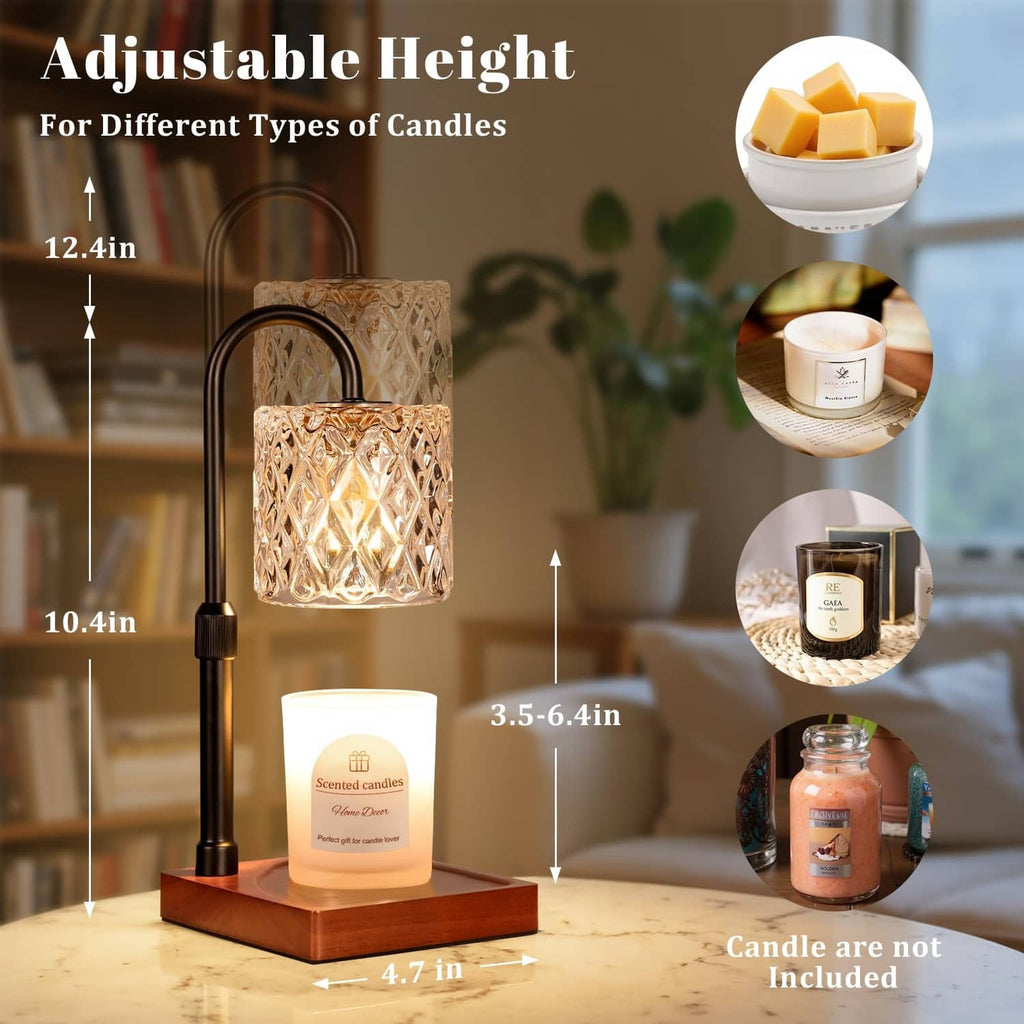 Black adjustable candle warmer lamp with faceted glass shade and lit wax candle on wood base