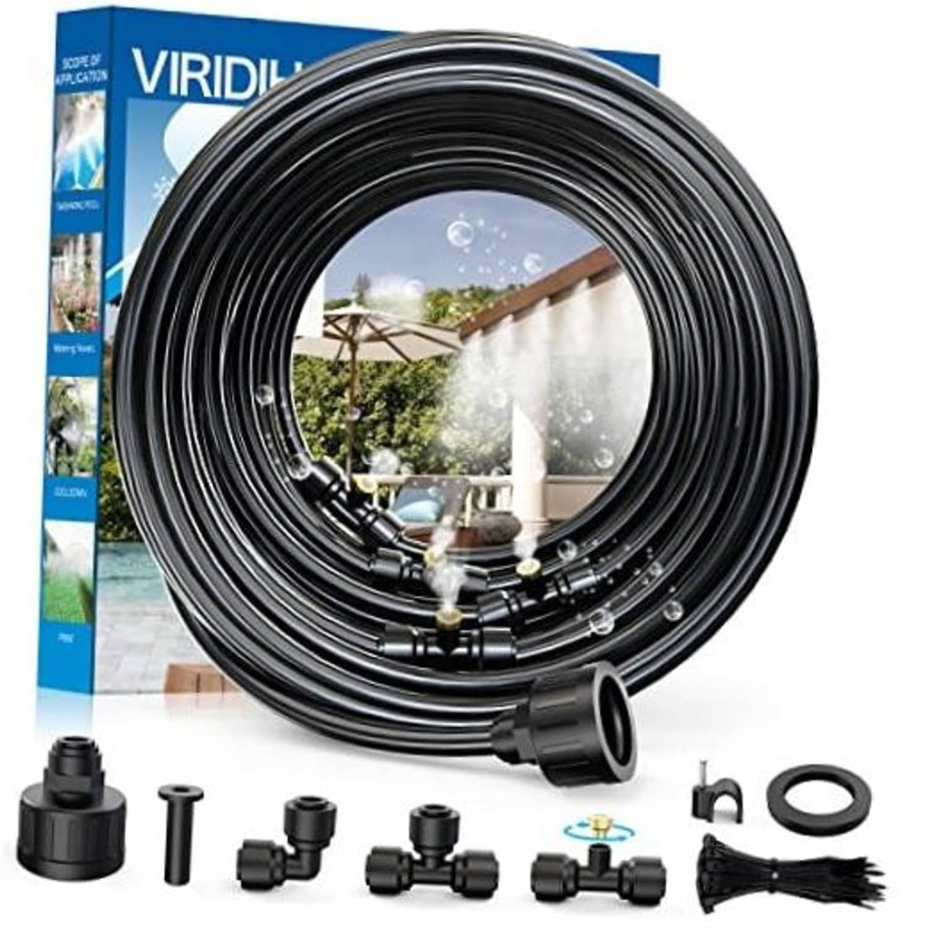 Rolled black misting hose with brass fittings and connector pieces in a kit