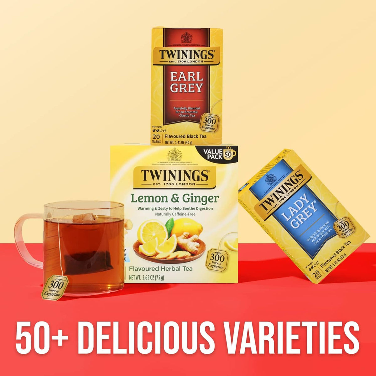 Twinings tea variety boxes with teacup, including Lady Grey and Lemon & Ginger