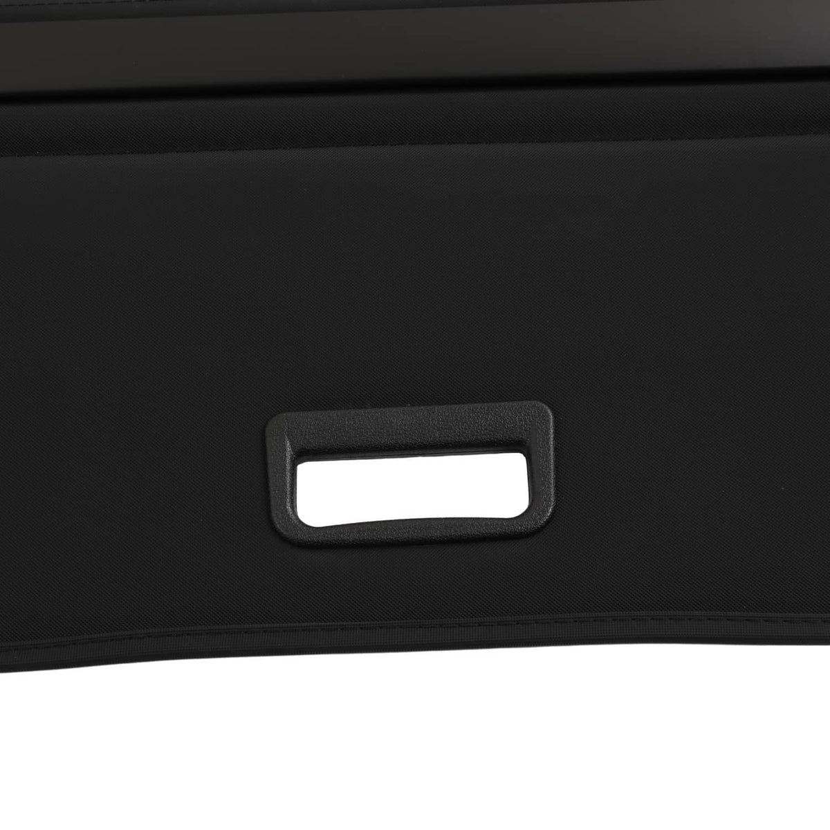 Black rear cargo cover with rectangular handle cutout and textured edge trim.