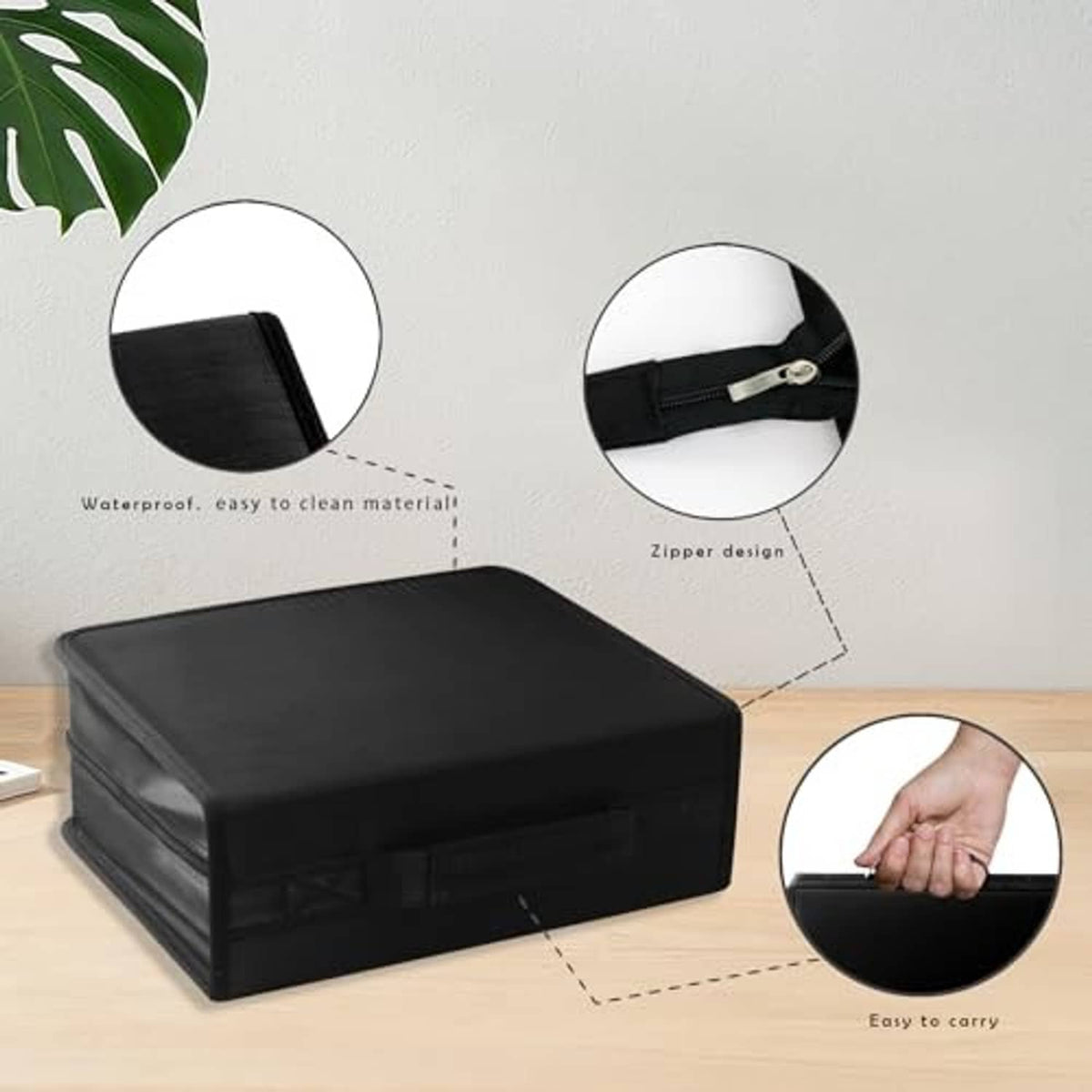 Black disc storage case with zipper closure, top handle, and carry strap
