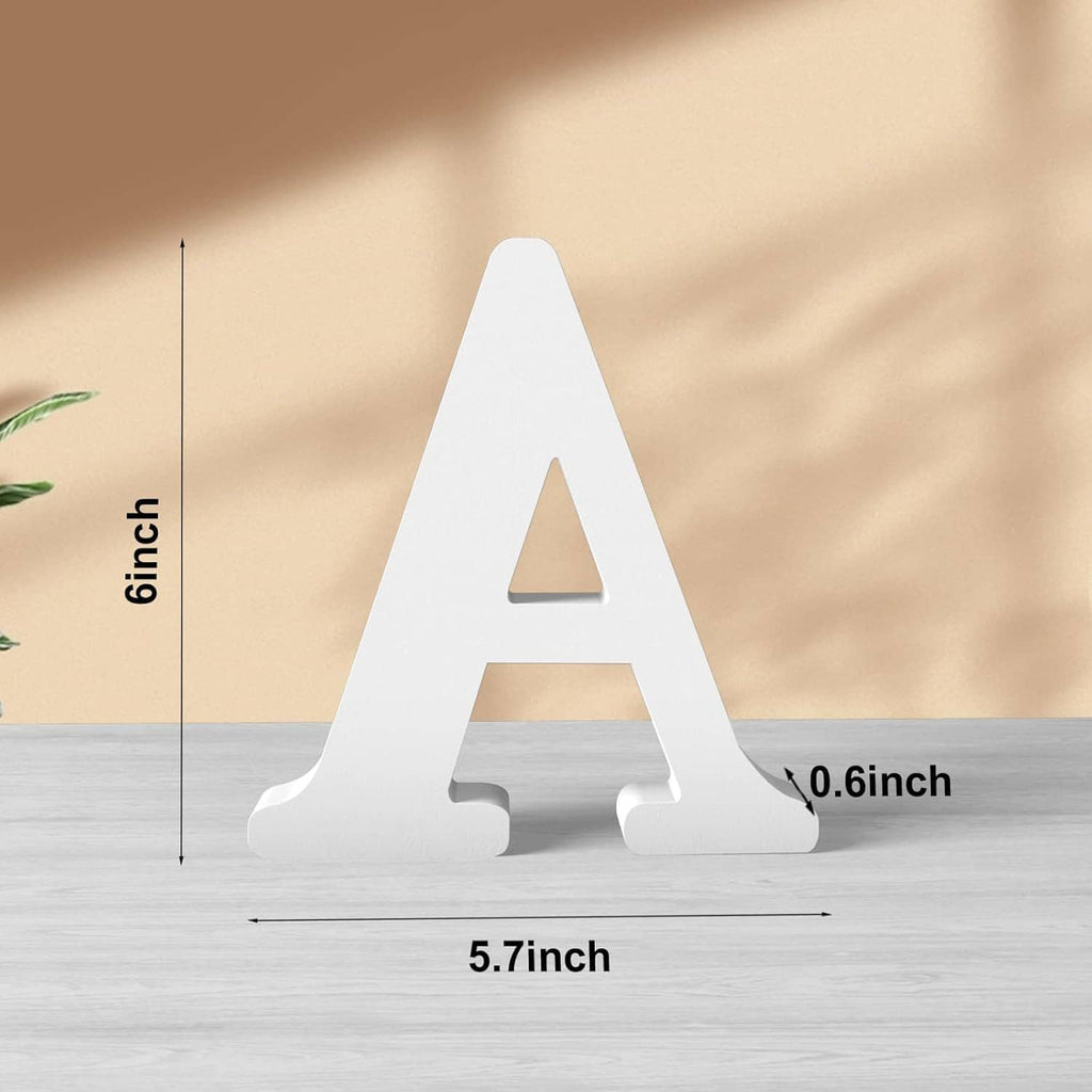 White wooden letter A with cutout center, freestanding on base