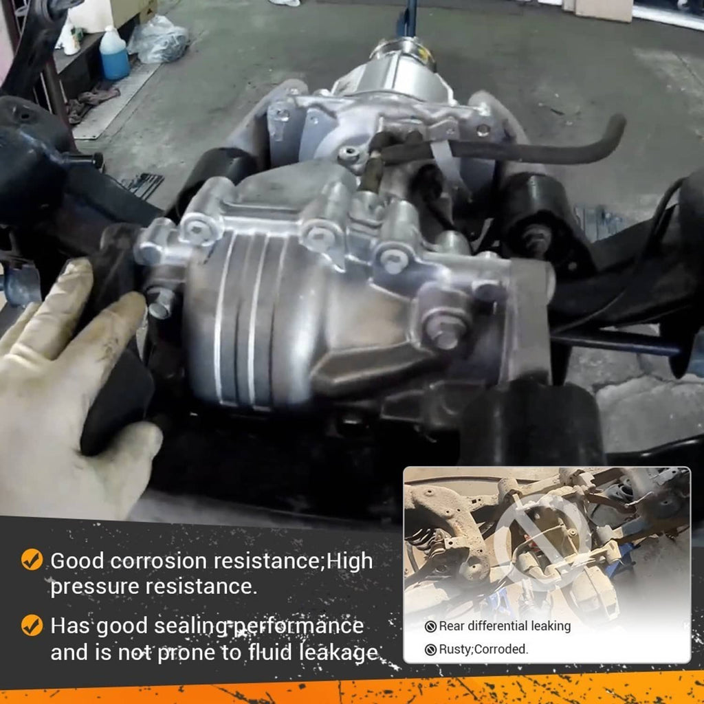 Rear differential assembly installed with silver casing and visible axle components in a bay.
