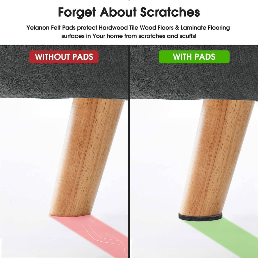 Black felt furniture pad protecting a wooden furniture leg from scuffs