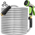 Metal garden hose coil with green-and-black trigger nozzle and brass connector fittings