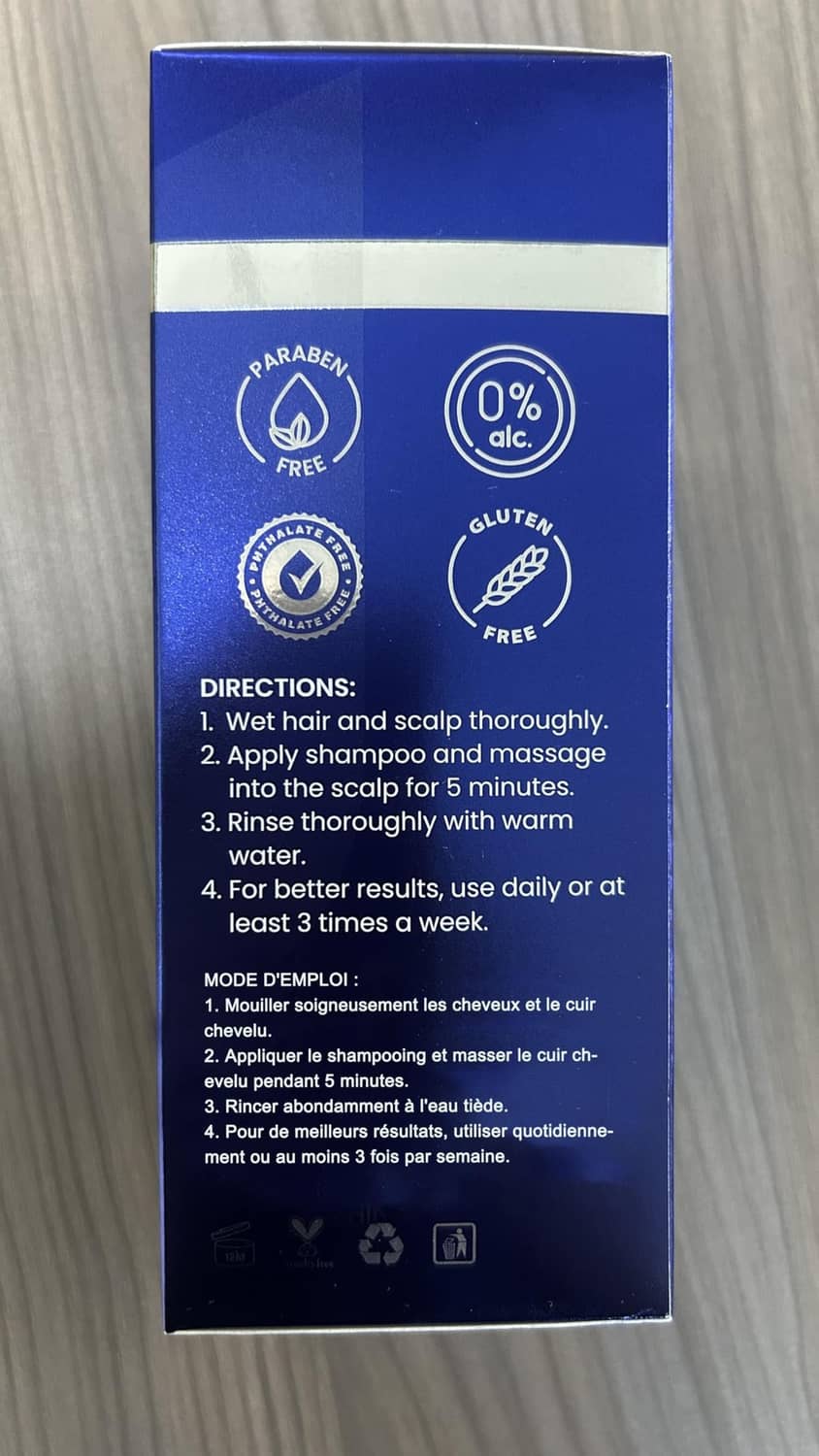 Men's hair growth shampoo box back directions and free-from icons on blue panel
