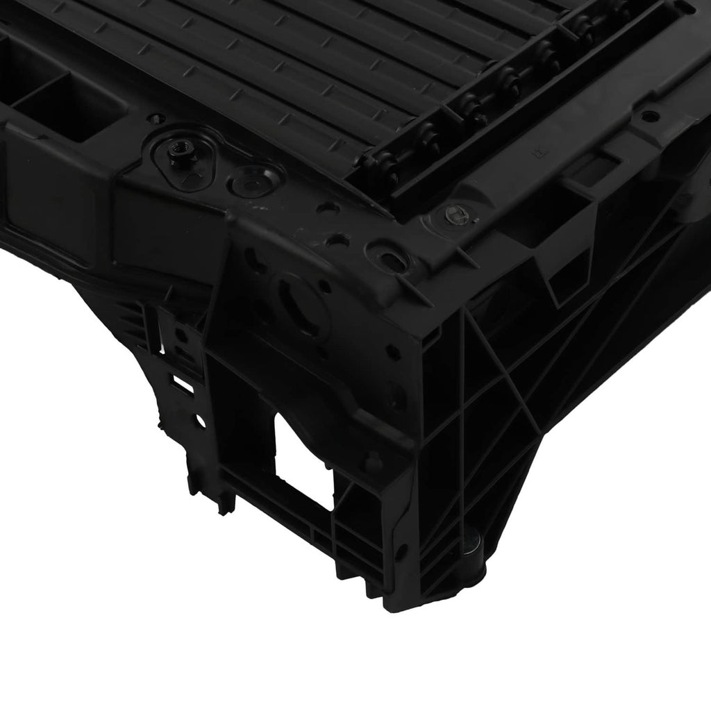 Side detail of black radiator support air shutter grille with brackets and mounting points