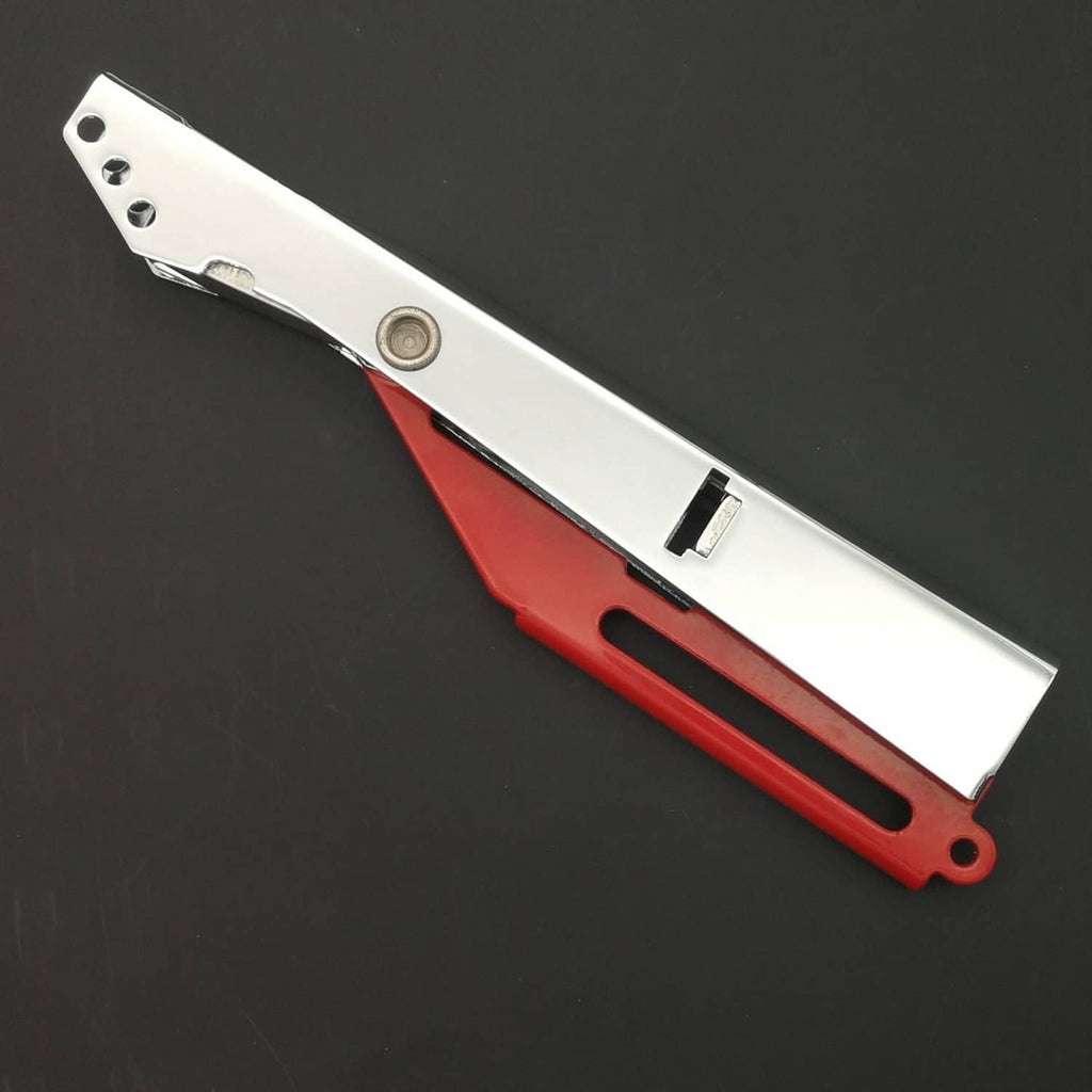 Silver metal striker head and red handle with oval end loop