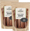 Duck jerky strips in two kraft paper pouches with Farm Hounds labels