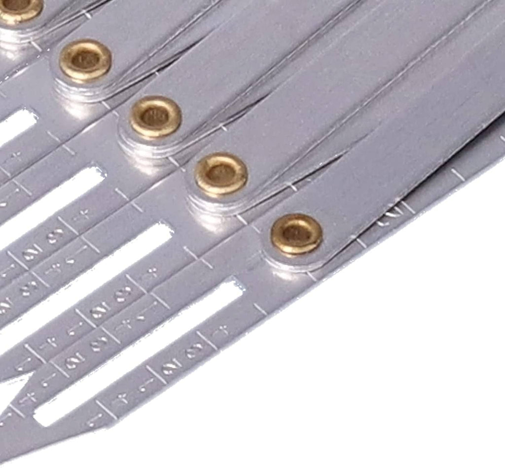 Close-up of aluminum divider gauge with brass rivets and measurement lines