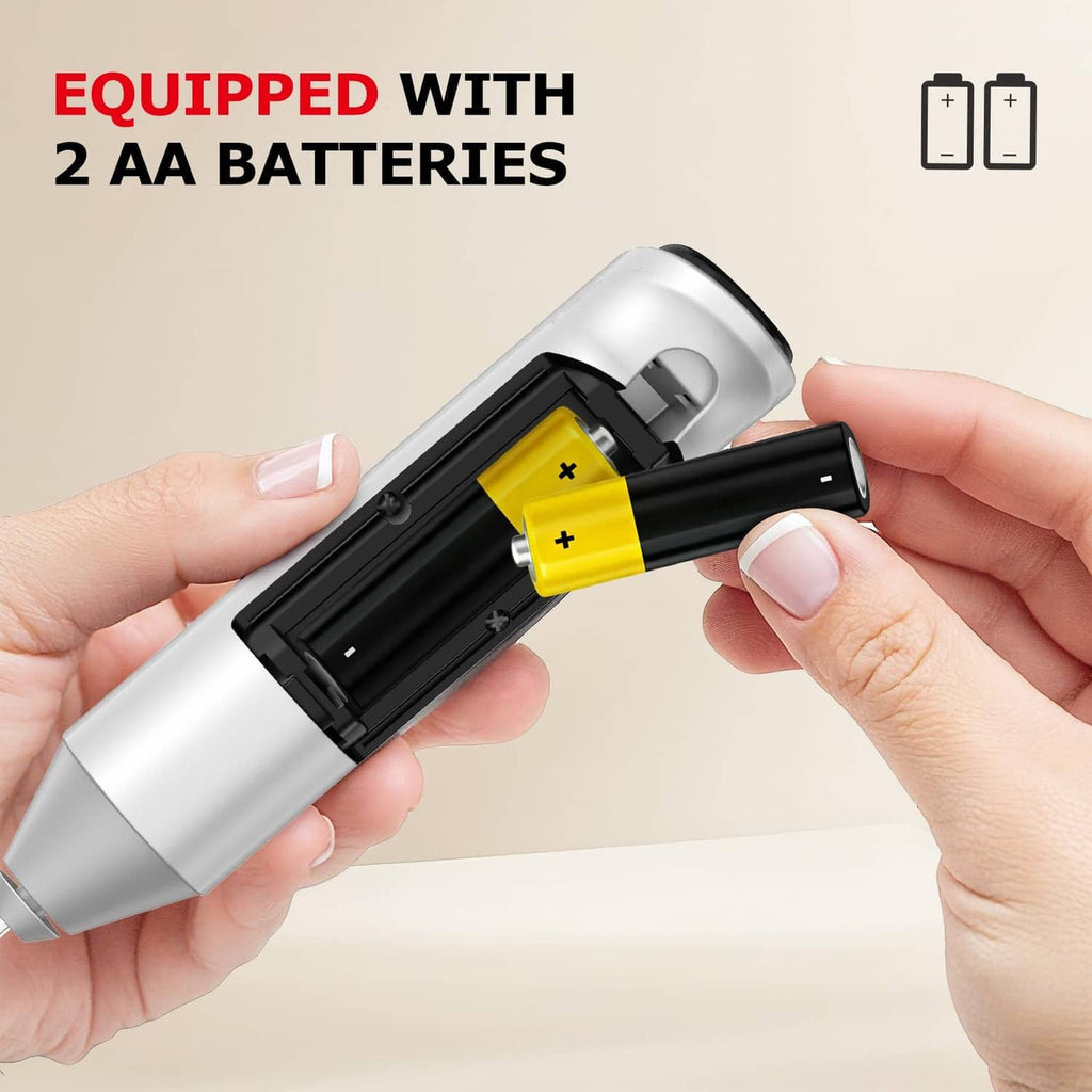 Silver milk frother with open battery compartment, showing two AA batteries
