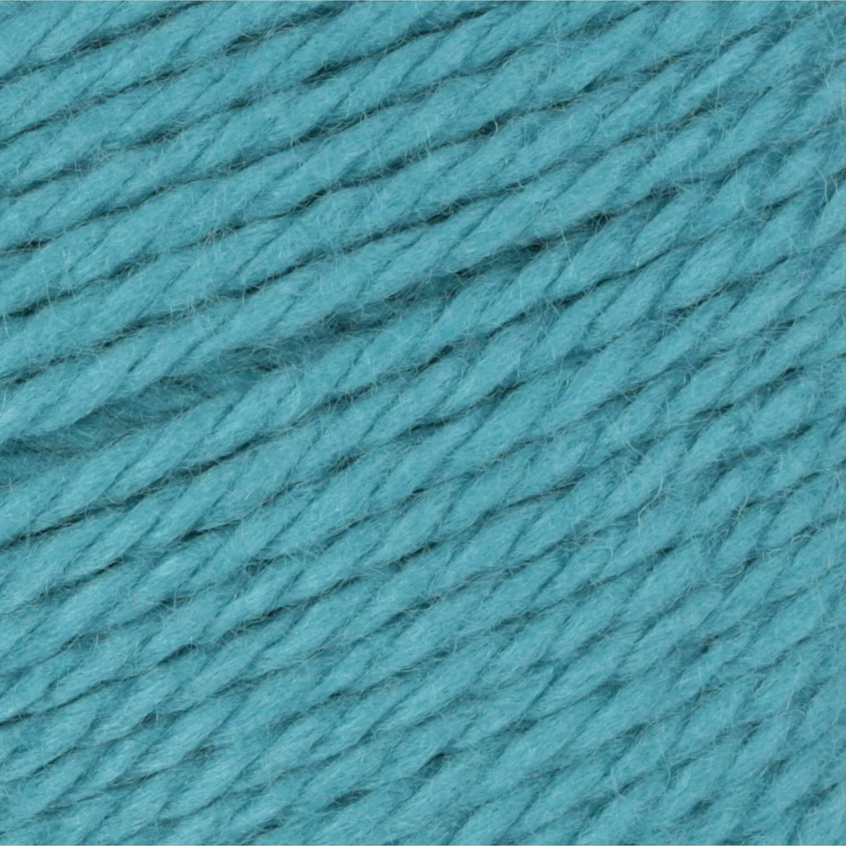 Teal blue acrylic yarn close-up showing twisted texture