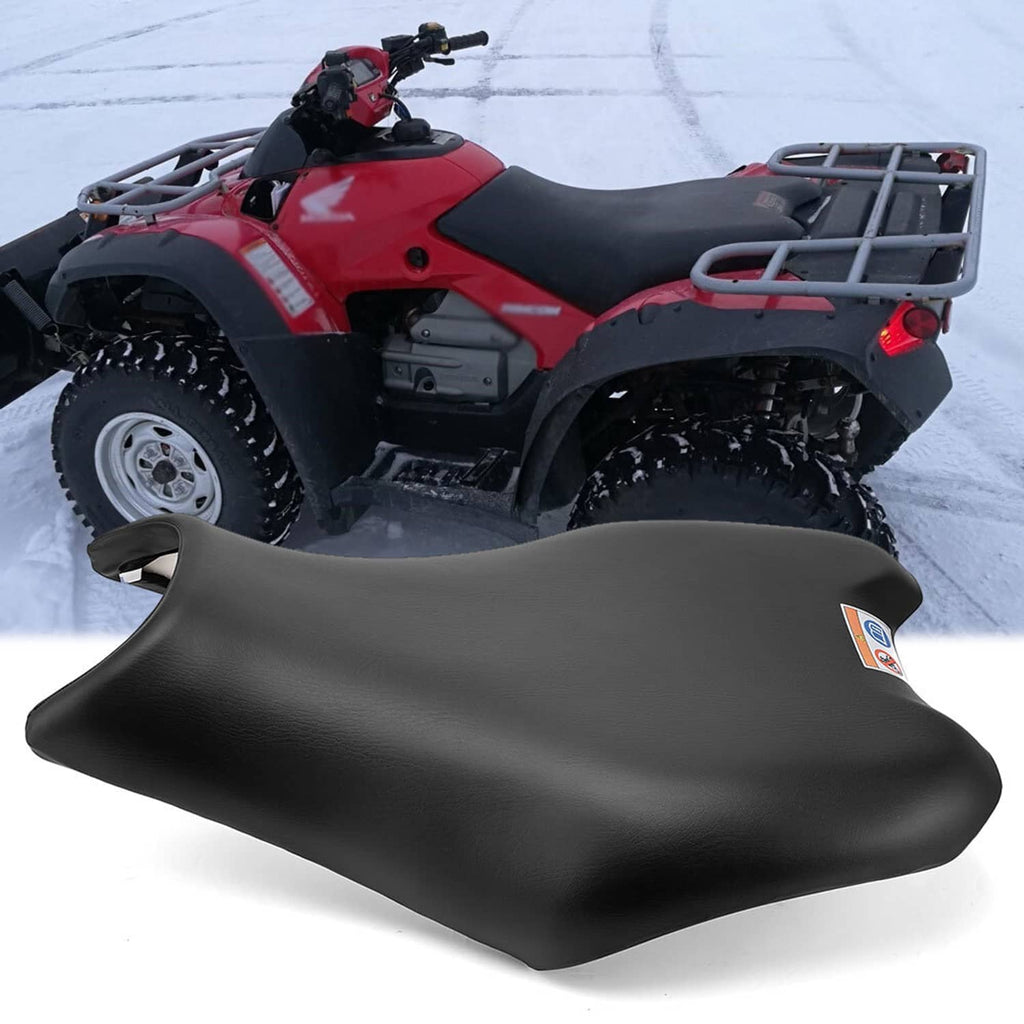 Black ATV seat with smooth finish, rear grab opening, and front edge lip