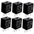 Set of six black 4-pin 12V automotive relays with prong terminals, labeled 2313A11