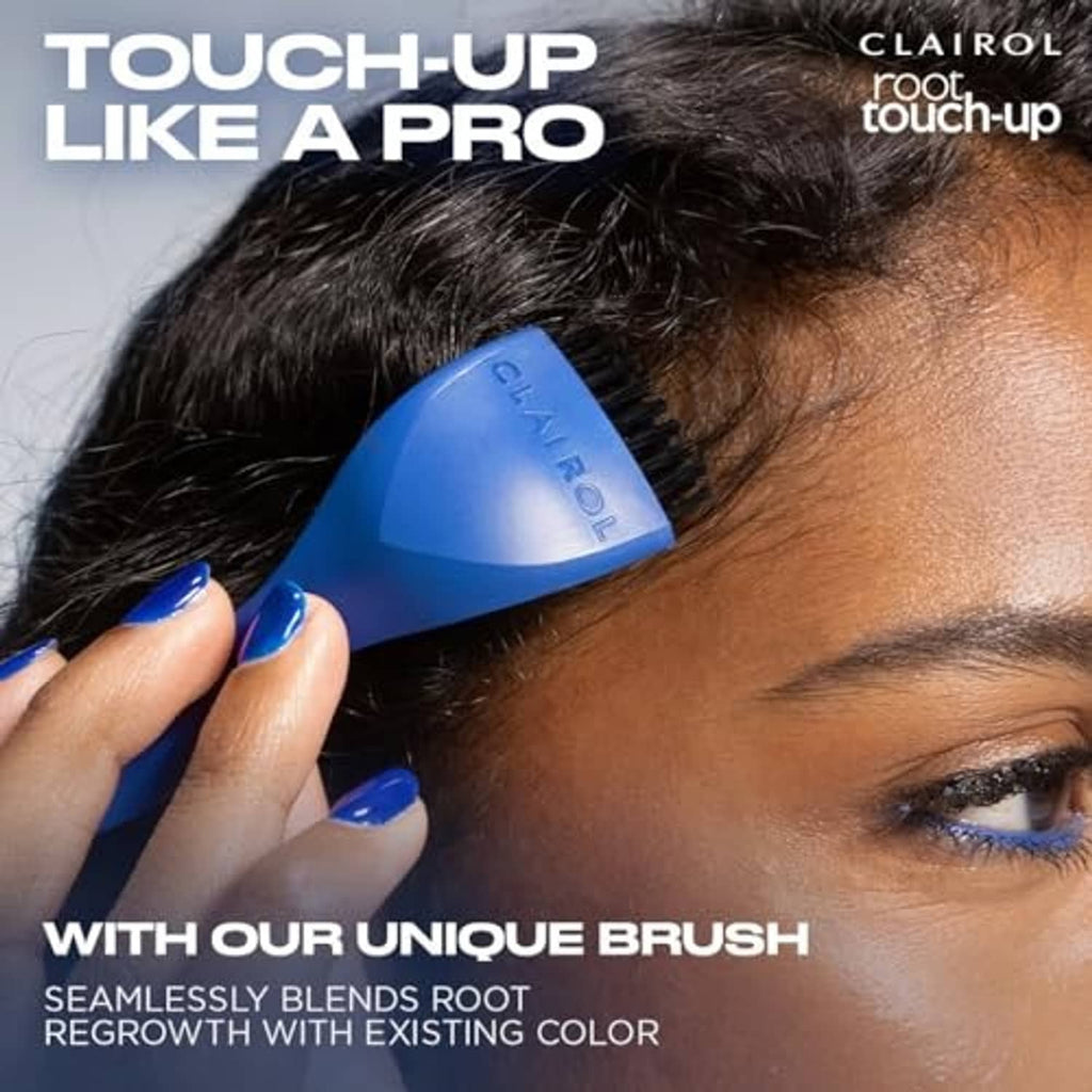 Clairol root touch-up applicator brush applying hair color to roots on dark hair
