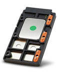 Engine ignition control module with green center plate and orange connector terminals, black housing
