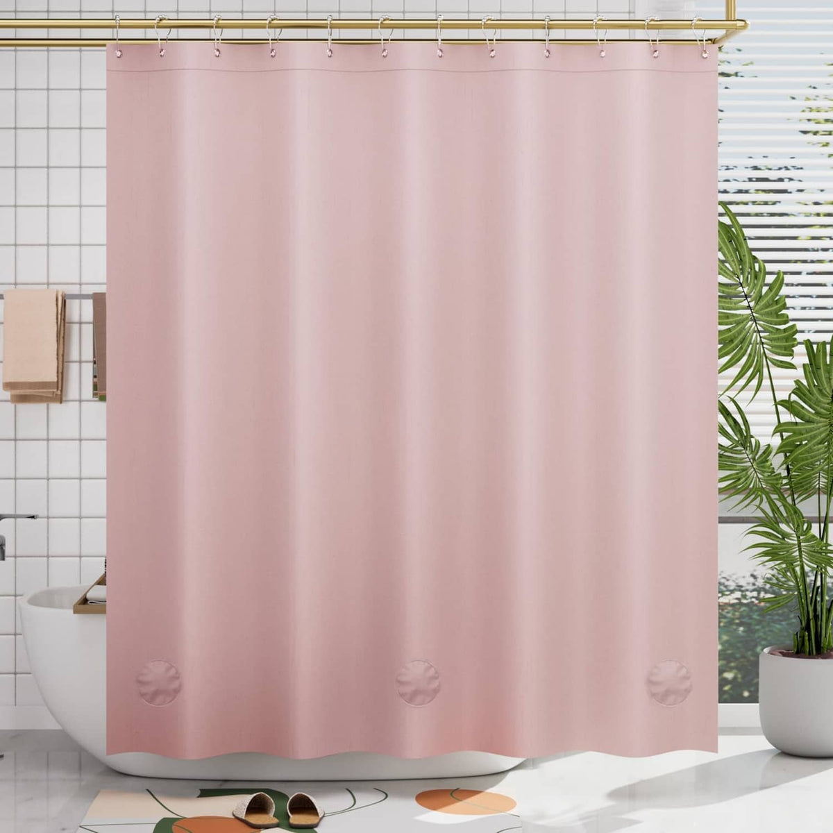Light pink shower curtain with grommet holes and subtle embossed pattern