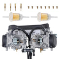 Dual carburetor assembly with two air intakes, fuel lines, and brass jet fittings