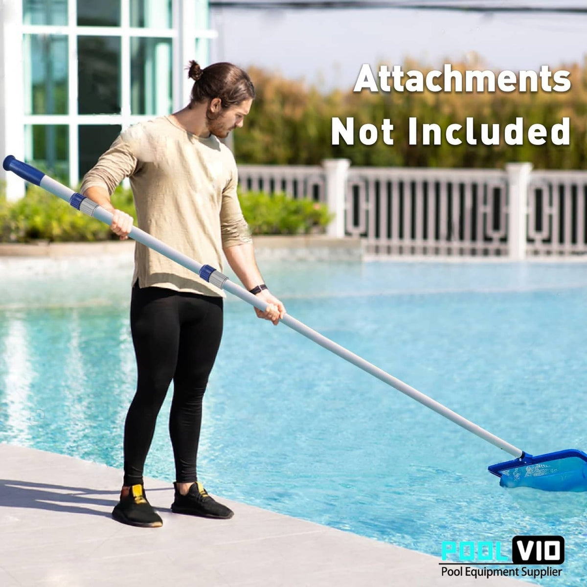 Telescopic pool pole held by person with blue handle