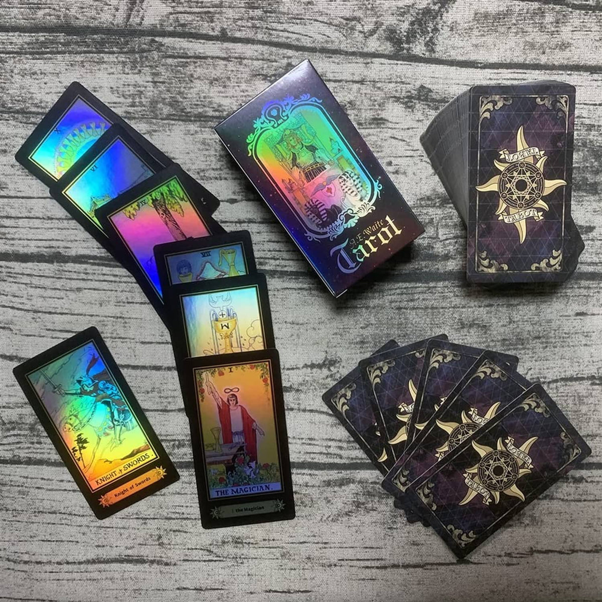 Multicolor tarot cards laid out with dark backing and gold star motif