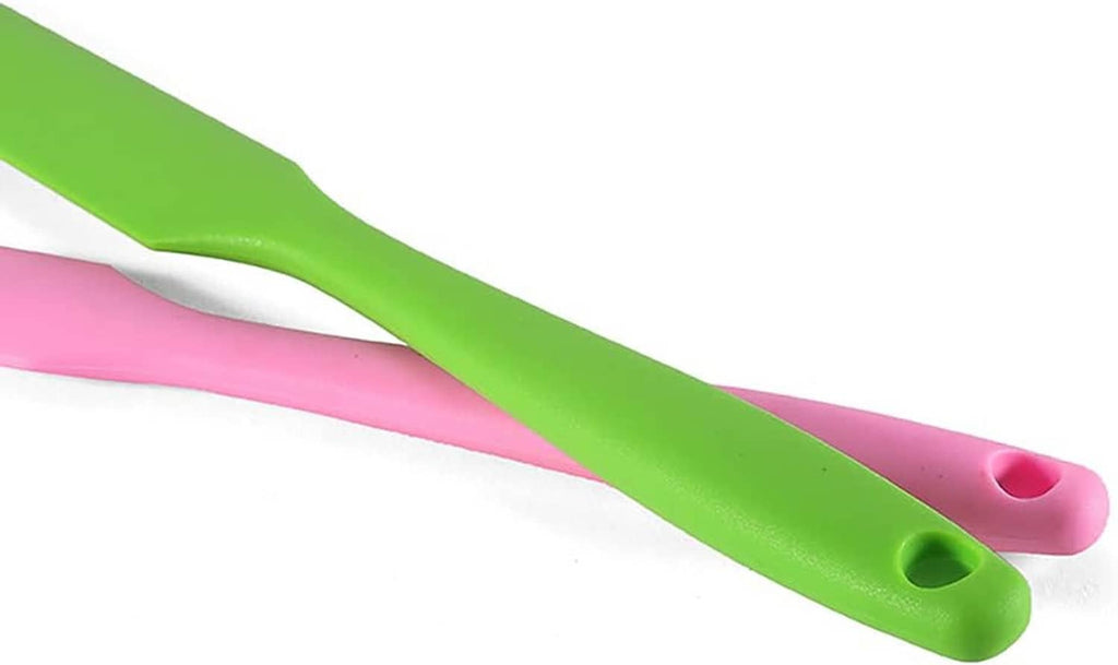 Green and pink silicone spatulas with hanging holes, smooth flexible blades