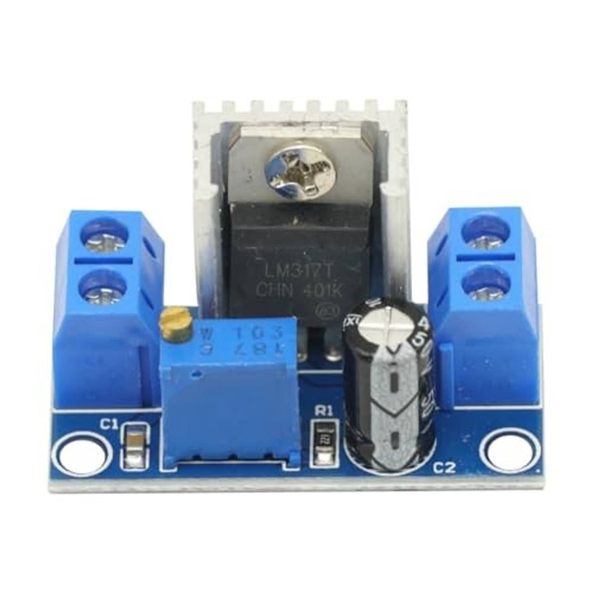 LM317 adjustable voltage regulator module board, central IC with blue terminal blocks