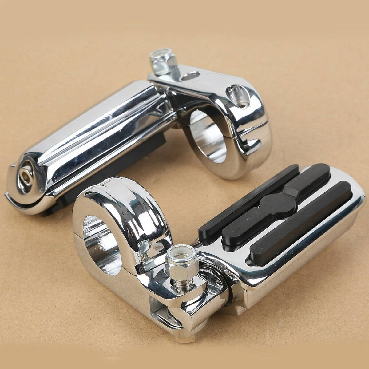 Chrome highway foot pegs with black rubber inserts and U-bolt bracket mounts