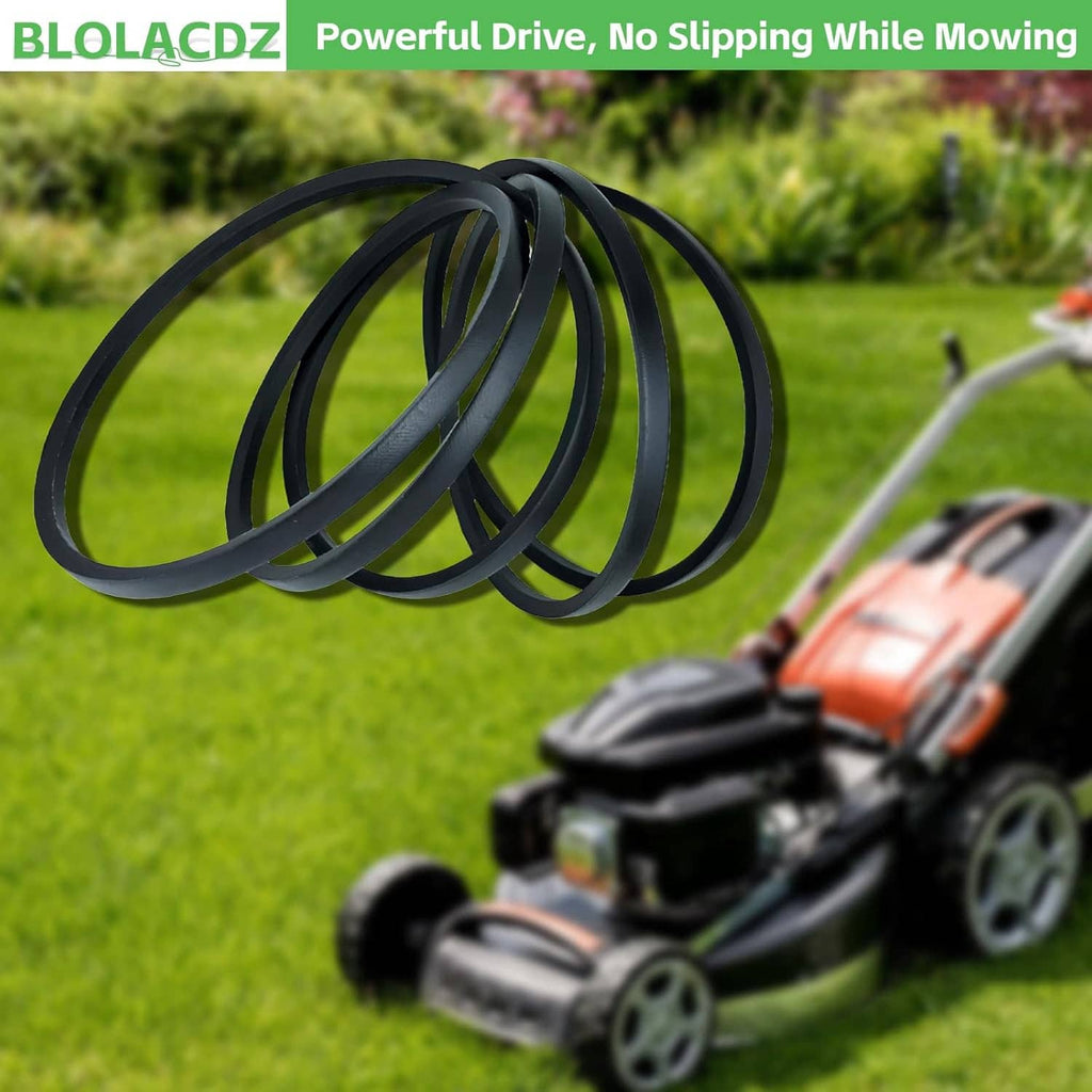 Black lawn mower drive belt coil on grass, close-up view of the looped band