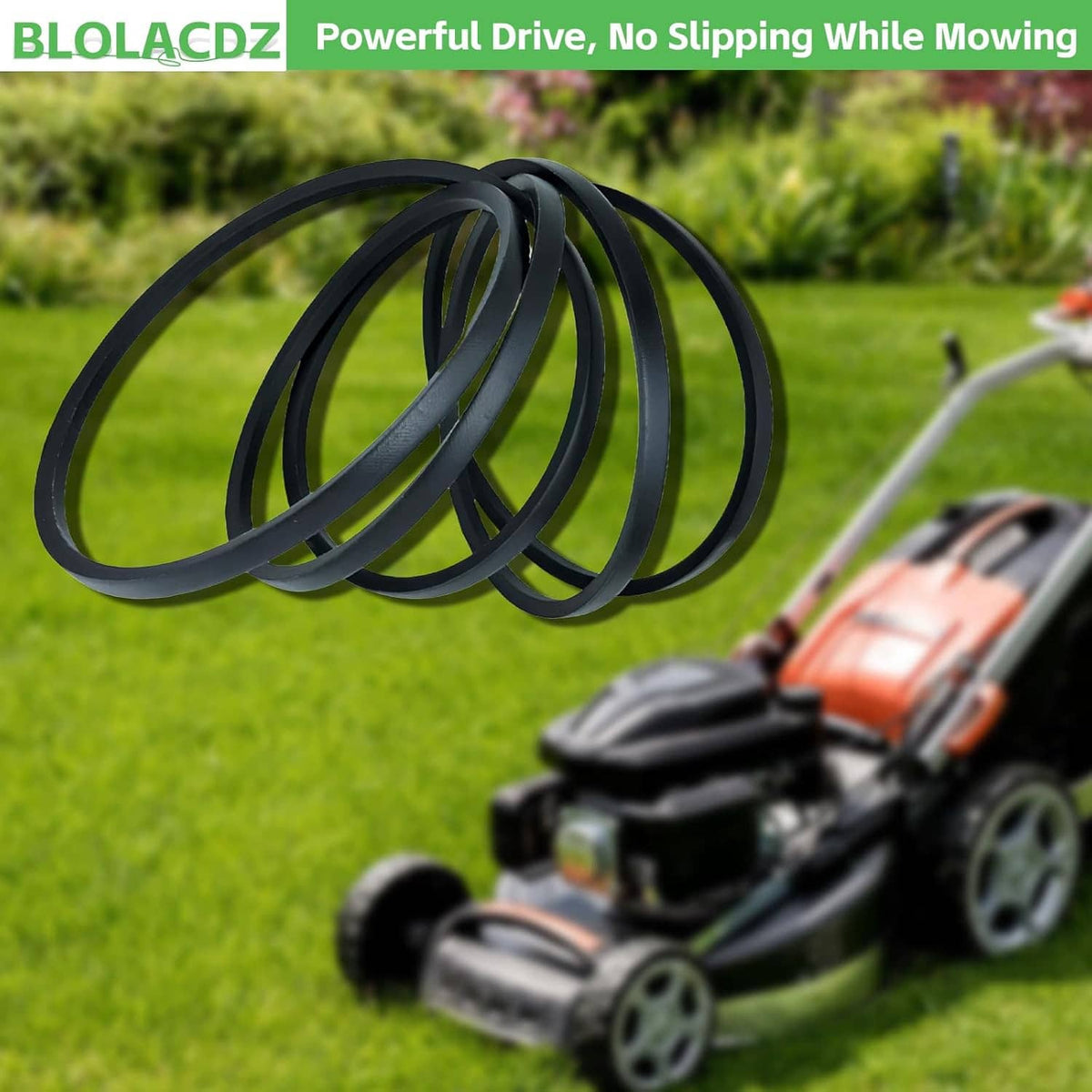 Black lawn mower drive belt coil on grass, close-up view of the looped band