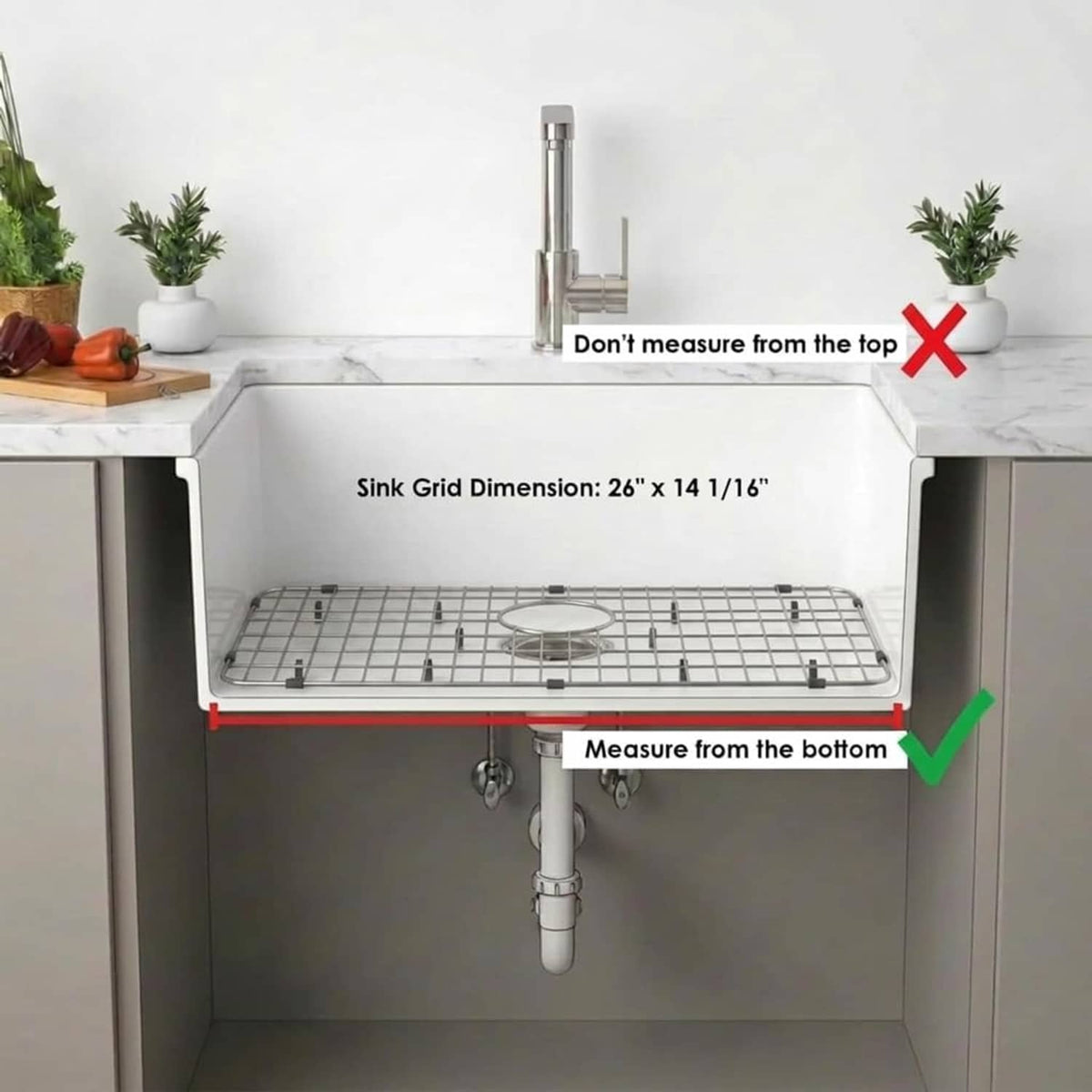 Stainless steel sink grid protector installed in sink with round drain opening