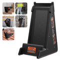 Black ladder leveling tool with textured platform and non-slip base pads