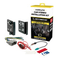 Double DIN radio dash installation kit with black brackets, wiring harness, and hardware