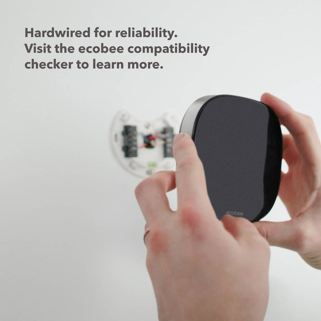 Black smart security keypad device with hands holding for mounting