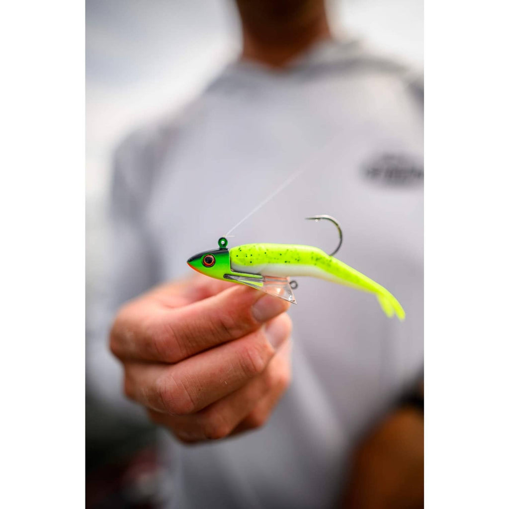 Lime green fishing minnow lure with red eye and treble hook