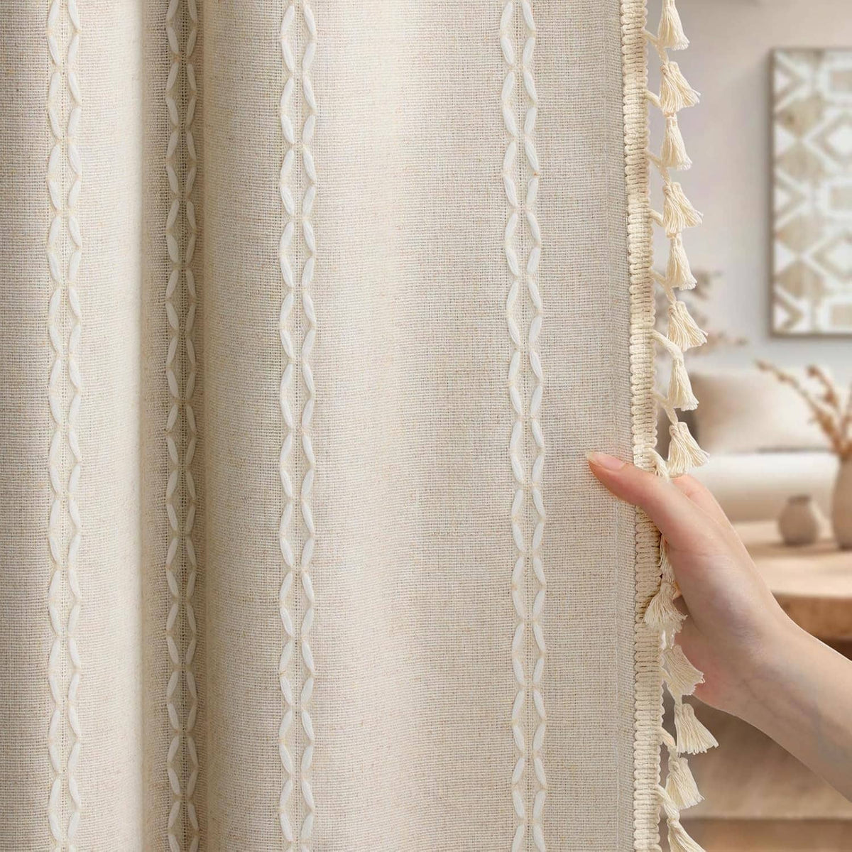 Beige blackout curtain panel, braided pattern and tassel-trimmed side edge