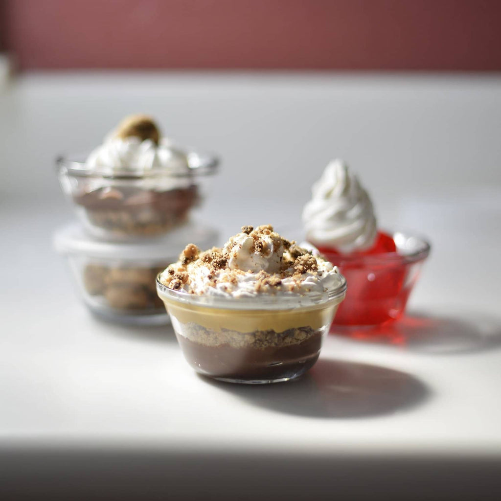 Clear glass dessert cups filled with layered treat