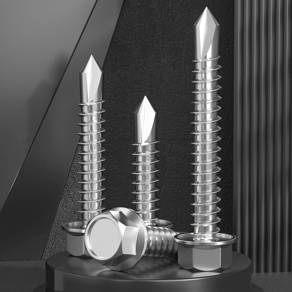 Silver self drilling screws with hex heads and washers standing upright on a base