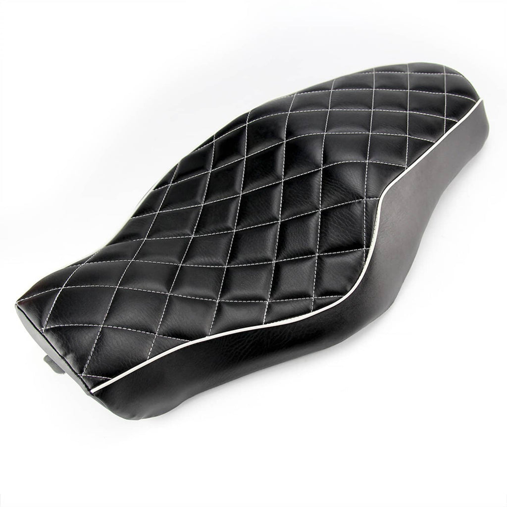 Black motorcycle seat with diamond stitching, white contrast piping, contoured saddle