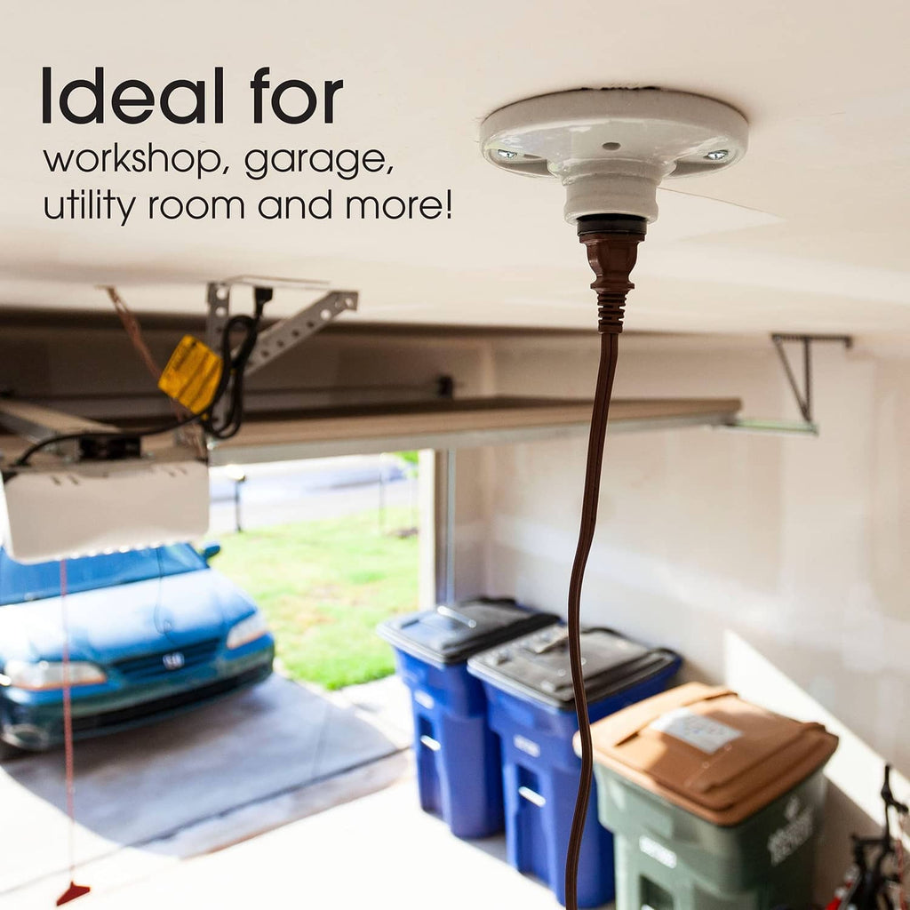 Polarized outlet adapter installed on ceiling light socket, for workshop use
